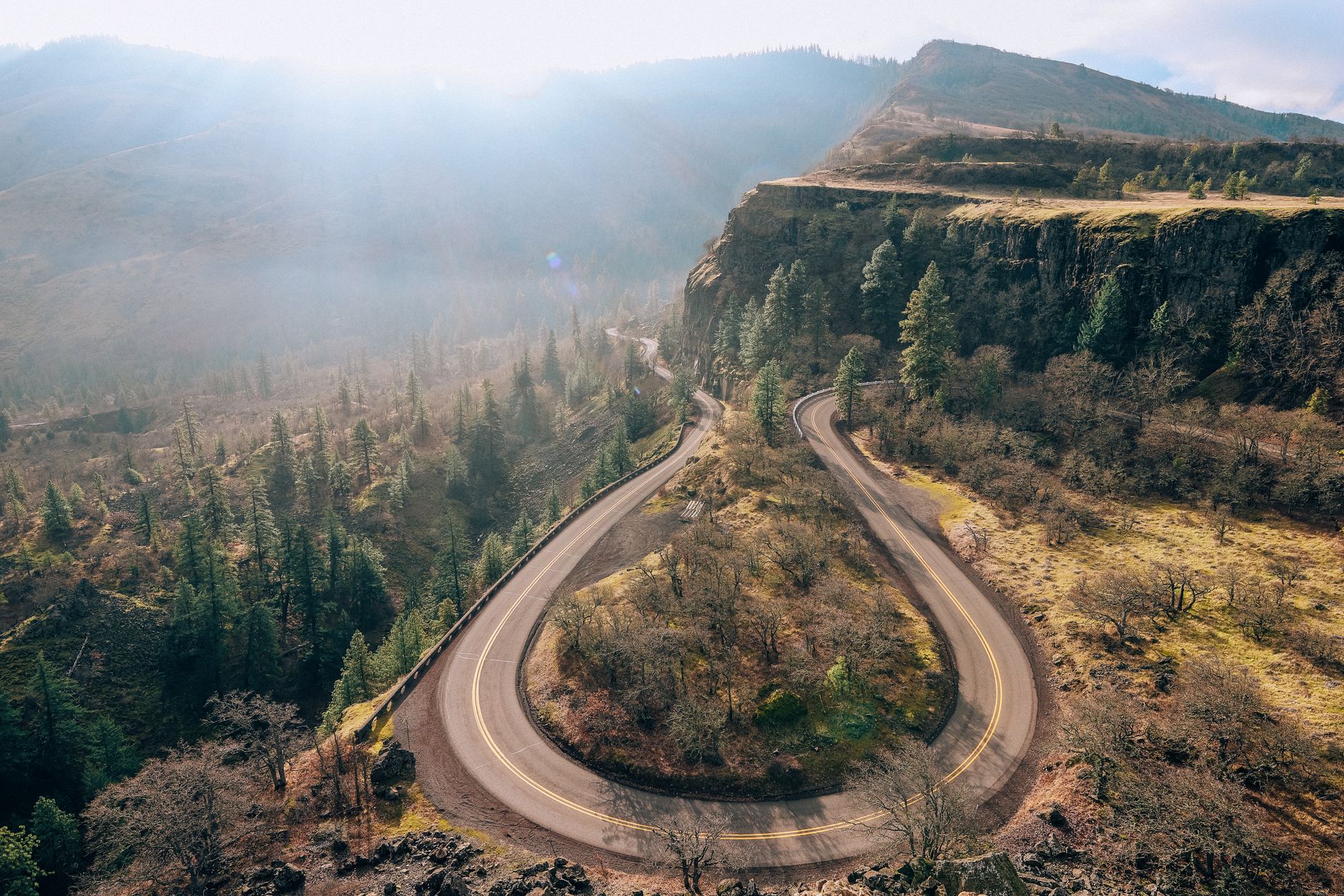 Cover for Pacific Northwest self-drive itinerary with scenic coastal highway illustration